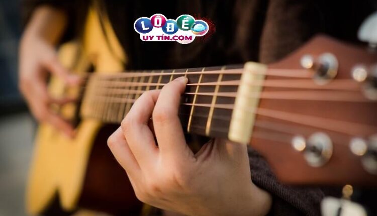 Giải mã giấc mơ guitar - Mơ thấy đàn guitar đánh con gì